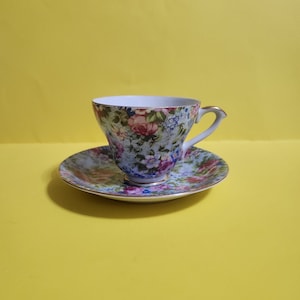 Fine Bone China Teacup and Saucer Set Featuring a Light Blue Color with a Colorful Floral Design, Numbered  **Free Shipping**