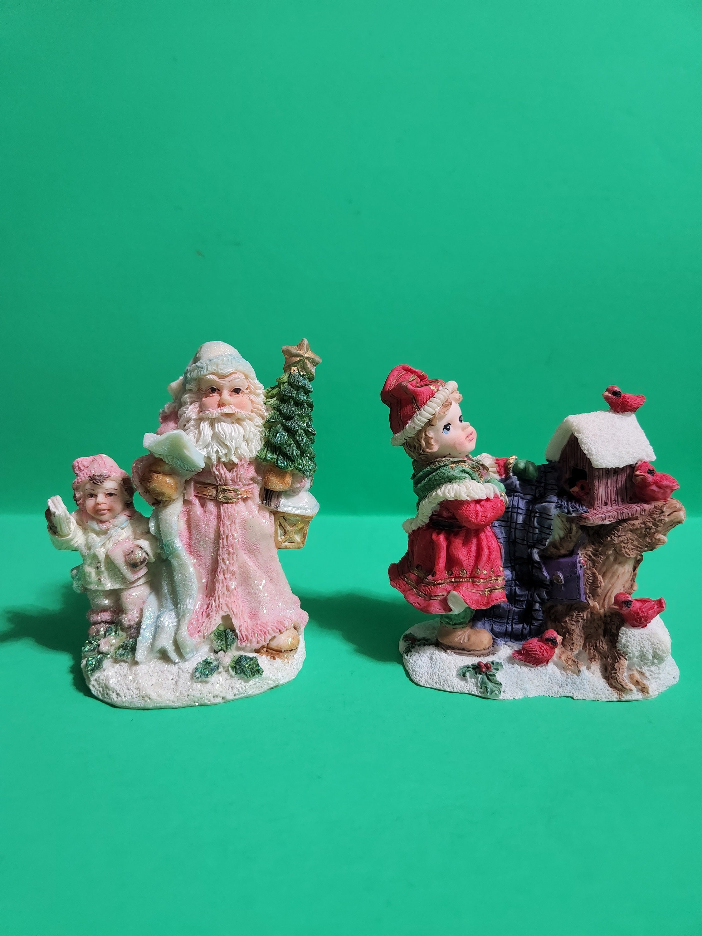 Set of 2 Mismatched Christmas Figurines, One is an Elf by a