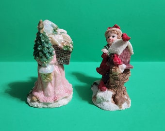 Set of 2 Mismatched Christmas Figurines, One is an Elf by a