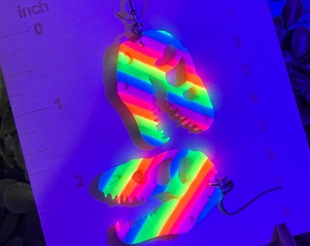 Raver Dino Skellies! Blacklight reactive rainbow dangle earrings! Handmade in Michigan!
