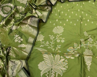 May include: An olive green fabric featuring a woven metallic gold floral pattern. The textile displays large, intricate mandala-style blossoms and smaller scattered floral motifs, with a wide decorative border along the edge of the material.