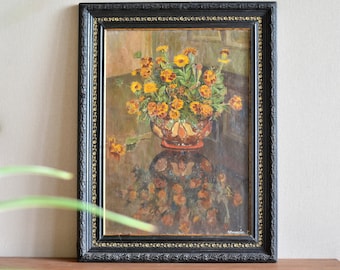Original vintage still life oil painting with flowers in an antique frame. Unique ancient art of the first half of the 20th century. Retro