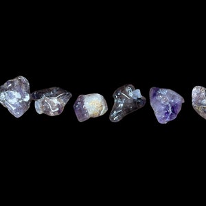 Super 7 Amethyst tumbles