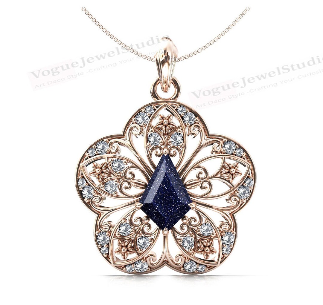 PUNK CARVED BLUE SANDSTONE PENDANT main image 1