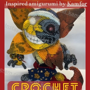 Könnte beinhalten: Gehäkelte Amigurumi-Puppe mit Sonnen- und Mond-Design, in den Farben Gelb, Orange, Braun und Blau. Die Puppe hat ein lächelndes Gesicht und trägt ein blaues Outfit mit Sternen. Der Text "ECLIPSE" und "CROCHET PATTERN" sind zu sehen.