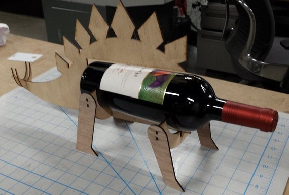 Stegosaurus shaped wine bottle holder file cdr and dxf vector download for  Laser cut CNC