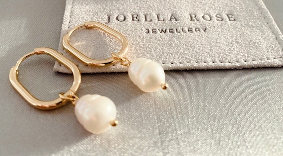 Orecchini a cerchio con perle barocche in oro rosa 18 carati