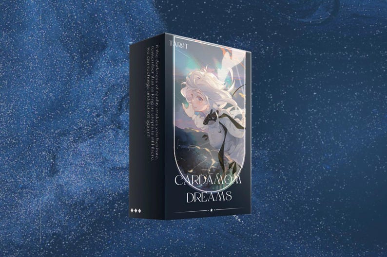 May include: A black box with a white and blue illustration of a woman with wings. The box has the text "CARDAMOM DREAMS" on it.