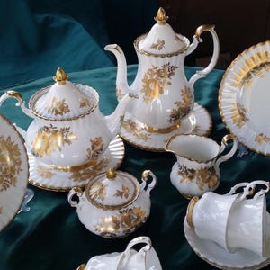 Royal Albert Golden Rose Teapot, Coffee Pot, Cream, Sugar, 8 lunch Plates, 8 Val D&#39;or Teacup Sets with Gold Trim