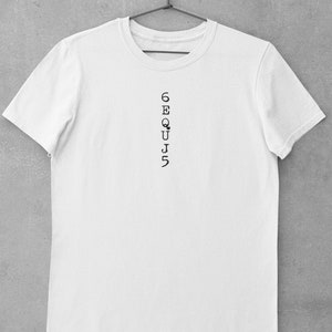 May include: White t-shirt with the word "6EQUJ5" printed vertically on the front.