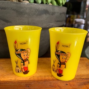 Vintage Aladdin yellow plastic juice cups