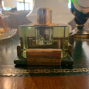 Vintage green lucite/glass table lighter with brass and leather holder