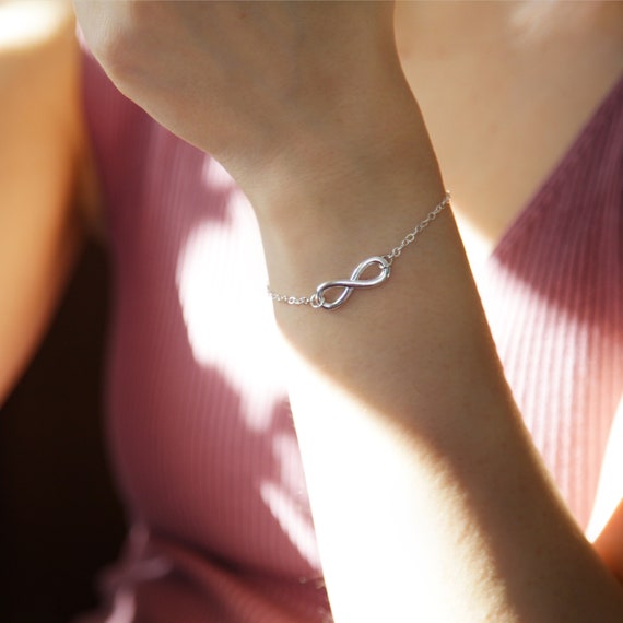 Infinity Love Bracelets | Love is infinite, eternal and forever present  within our heart. May this infinity love bracelet brings you and your love  ones unconditional love. Shop... | By Eleganzia Silver JewelryFacebook