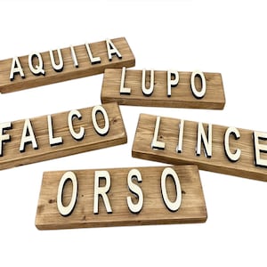 May include: A rustic wooden sign with the text "Welcome to our home" in a handwritten style. The sign features a distressed finish and a simple, inviting design, perfect for a front porch or entryway.