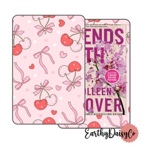 May include: A pink and white digital reader cover with a cherry and bow pattern. The cover is designed to fit a Kindle Paperwhite. The cover has a bookmark with the text "ENDS WITH US" by Colleen Hoover. The book cover features a pink orchid with a white background.