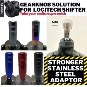 May include: A set of five gear shift knobs for a Logitech shifter. The knobs are made of metal and come in a variety of colours, including black, blue, red, and silver. The knobs are designed to improve the realism of driving simulations. The text "STRONGER STAINLESS STEEL ADAPTOR" is visible in the image.
