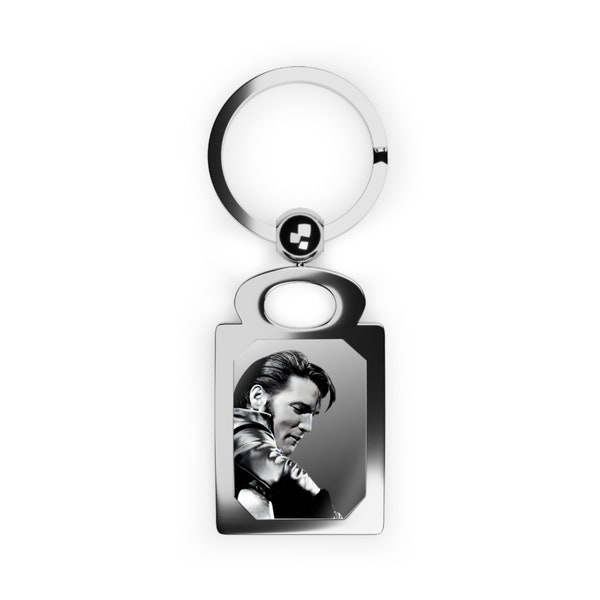 Elvis. Elvis Presley playing guitar in black and white in a rectangle photo keyring