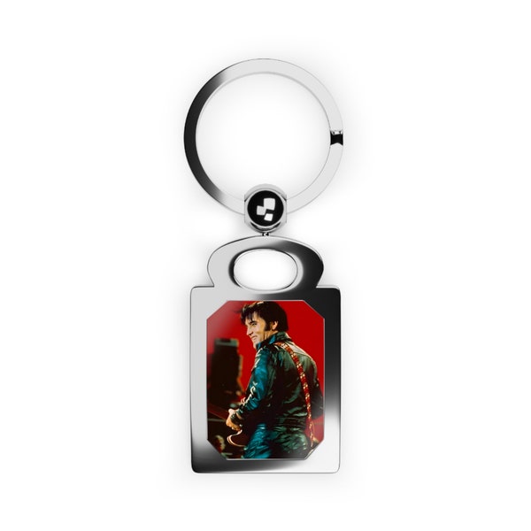 Elvis, Elvis Presley, Elvis The King of Rock and Roll holding one of his guitars in color in a rectangle photo keyring.