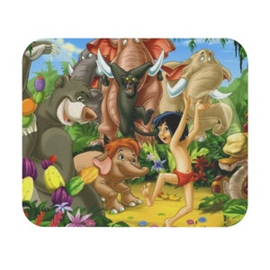 May include: A colorful illustration of Mowgli from Disney's Jungle Book with Baloo the bear, King Louie, and other jungle animals. The illustration is set against a green jungle background.