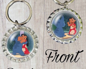 Lilo and Stitch from the Disney movie Lilo and Stitch,Stitch gets adopted.Bottlecap keychain,keyring,bag charm,zipper pull kids, memorabilia
