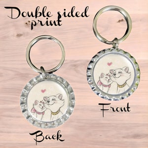 Marie and Duchess from Disney&#39;s movie The Aristocats bottlecap keychain,keyring,bag charm,zipper pull kids, fish extender gift, memorabilia.