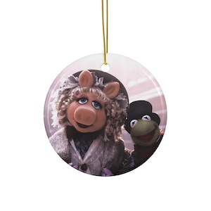 Disney The Muppets Christmas Carol metal ornament featuring Kermit the Frog and Miss Piggy.