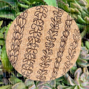 May include: A round cork coaster with a botanical design. The coaster features a natural cork color with a repeating pattern of black line art depicting stylized plant stems and leaves. The design is centered on the coaster.