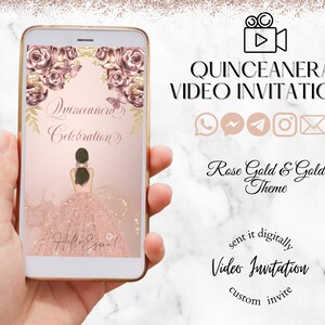 May include: A smartphone displays a rose gold and gold themed Quincea&ntilde;era video invitation. The invitation features an illustration of a girl in a pink gown, floral accents, and the text "Quincea&ntilde;era Celebration". The phone is held in a hand.