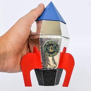 ロケットの記念品ボックス、宇宙の誕生日パーティーの記念品、宇宙をテーマにしたデコレーション、ロケット船のキャンディボックス、子供用銀河パーティー用品