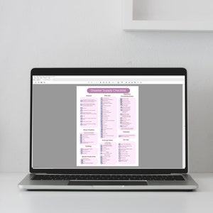May include: A laptop computer displaying a checklist titled "Disaster Supply Checklist". The checklist is divided into categories such as "General", "First Aid", "Emergency Documents", "Water", "Food and Water", "Clothing", "Special Needs Items", and "Other Items".