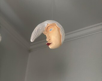 Handcarved and painted moon woman