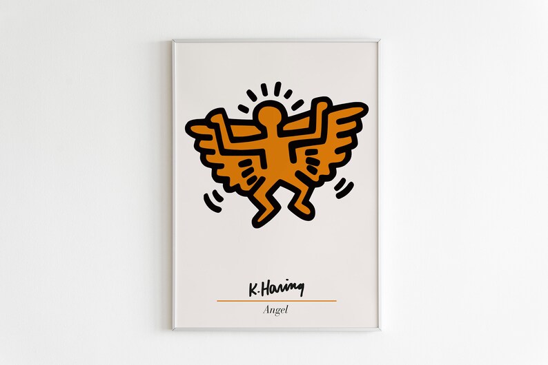 May include: A framed print of a stylized orange figure with wings, by artist Keith Haring. The print is titled "Angel" and is on a beige background.