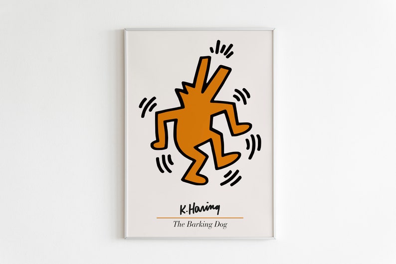 May include: A framed print of a black and white illustration of a dancing orange figure with the text "K. Haring" and "The Barking Dog" below the figure.
