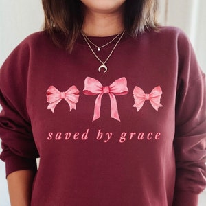 Saved By Grace Bow Sweatshirt Coquette Sweatshirt Christian Crewneck Coquette Clothes Coquette Clothing Christian Merch Christian Apparel
