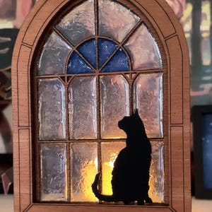 Mini gothic window light