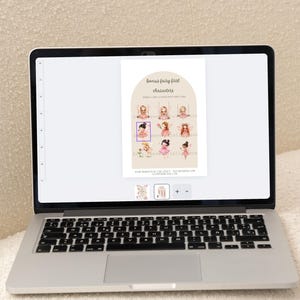 May include: A laptop displays a digital print featuring illustrations of fairies with varying hair colors and outfits. The text "bonus fairy first characters" is at the top. The bottom of the screen shows the text "Additional fairies with varying hair colors included".
