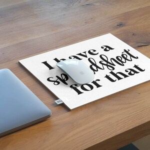 May include: White mouse pad with black text that reads "I have a spreadsheet for that".