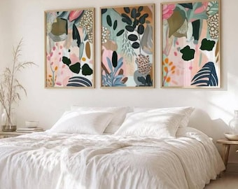 May include: Three rectangular wall art prints featuring abstract botanical illustrations in shades of pink, green, brown, and black. The artwork displays various leaf shapes, organic patterns, and textured elements arranged in a layered composition.