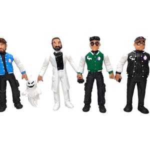 May include: Four action figures of men wearing varsity jackets. The figures are in various colors, including blue, green, and black. One figure holds a small white ghost. Each figure is holding a small black object.