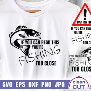 May include: A white t-shirt featuring a black and white graphic of a fish with the text "If you can read this you're fishing too close". The graphic is repeated in a smaller size in the bottom right corner of the image.