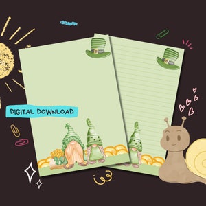 May include: Printable digital download of two green and white lined paper sheets with a gnome and a snail illustration. The paper sheets have a green shamrock hat and gold coins at the bottom. The text "DIGITAL DOWNLOAD" is at the top of the sheet.