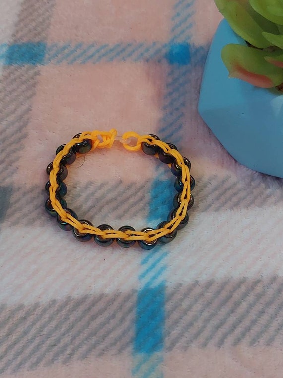Rubber band and bead bracelet deals