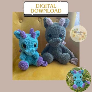 May include: Two crocheted dragon plushies, one teal blue with purple accents and one dark green with light gray accents. The plushies are sitting on a yellow couch.