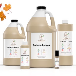 May include: Four bottles of Autumn Leaves fragrance oil in various sizes. The bottles are brown and have a white label with the Jersey Botanical logo and the text "Autumn Leaves". The smallest bottle is 1 fluid ounce, the next is 4 pounds (half gallon), the next is 8 pounds (gallon), and the largest is 32 fluid ounces.