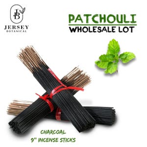 May include: A bundle of black charcoal incense sticks, tied with red string. The sticks are 9 inches long and have a patchouli scent. The image also includes a green leaf and the text "PATCHOULI WHOLESALE LOT" and "CHARCOAL 9" INCENSE STICKS".