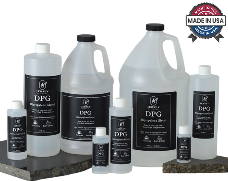May include: A set of six clear plastic bottles of Dipropylene Glycol (DPG) in various sizes, ranging from 2 oz to 1 gallon. The bottles are labeled with the brand name "Jersey Botanicals" and the product name "DPG Dipropylene Glycol". The bottles are arranged on a black surface with a "Made in USA" label in the background.