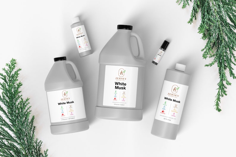 May include: Four bottles of White Musk essential oil from Jersey Naturals in different sizes: a 1 oz bottle, a 4 oz bottle, a 16 oz bottle, and a 32 oz bottle. The bottles are all gray and have a white label with the Jersey Naturals logo and the name of the scent.