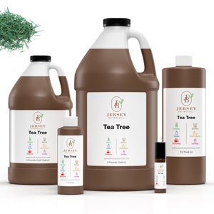 May include: Four brown bottles of Tea Tree essential oil from Jersey Botanical. The bottles are in different sizes, from a small roll-on bottle to a large gallon jug. The label on each bottle features the company logo and the words "Jersey Botanical" and "Tea Tree".