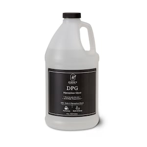 May include: A clear plastic bottle with a black cap and handle. The label is black with white text that reads "DPG Dipropylene Glycol" and "Jersey Botanicals".