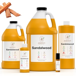 May include: Four bottles of sandalwood essential oil in various sizes, from a small roll-on bottle to a large gallon jug. The bottles are all yellow and have a white label with the Jersey Botanical logo and the words "Sandalwood" printed on them.